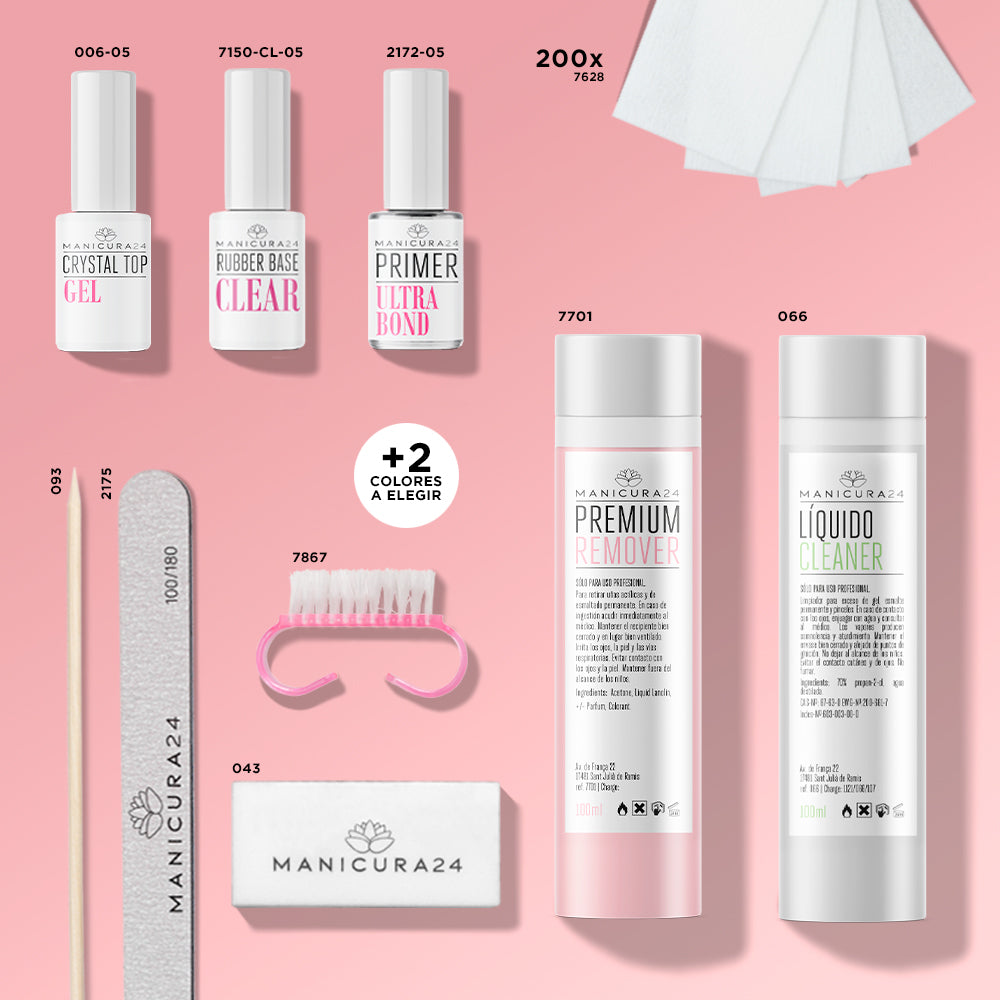 Kit de manicura con geles, primer, líquido limpiador, removedor, lima, palito, cepillo y esponja sobre fondo rosa.